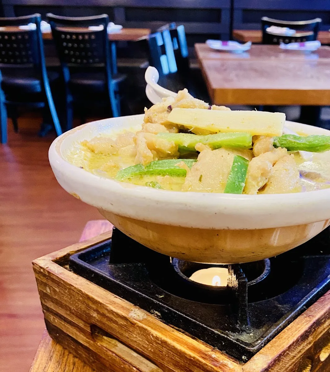Green curry served in a tabletop warming dish at Malay Morristown